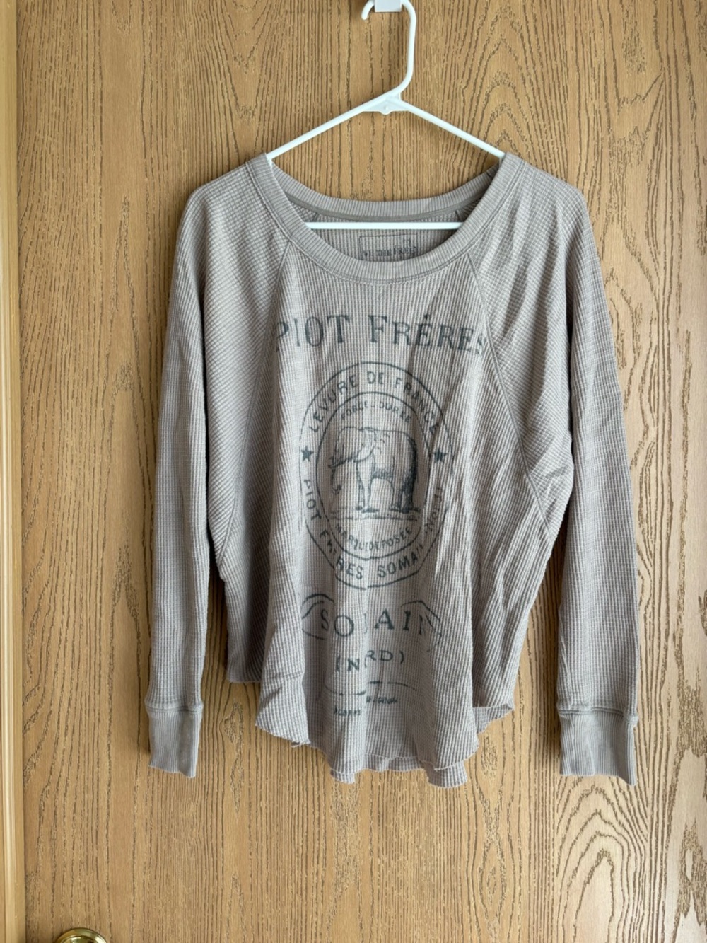 Free People waffle knit long sleeve top in taupe with black print